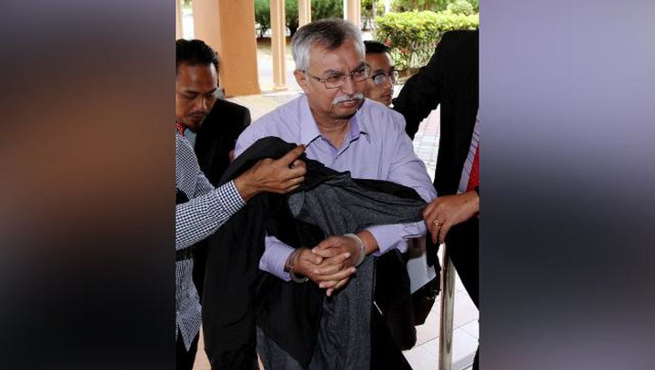 Ex-forestry department director claims trial to bribery charges