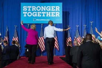 A first: Obama joins Clinton on the campaign trail
