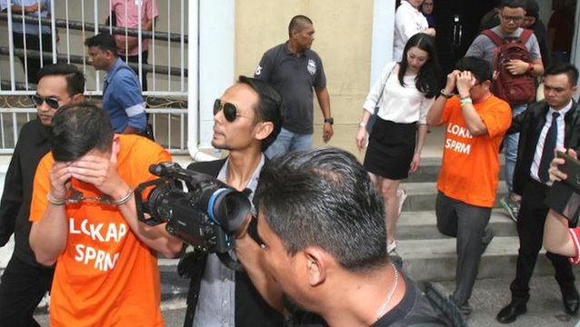 Five ‘agents’ remanded in work permit bribery probe