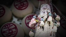 Tough cookies brave heights at Hong Kong bun festival
