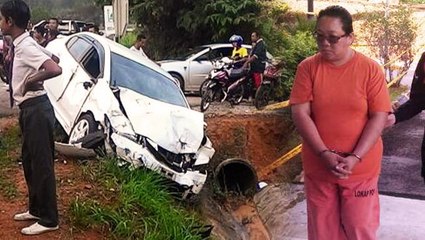 Woman pleads not guilty to causing death of senior police officer and wife