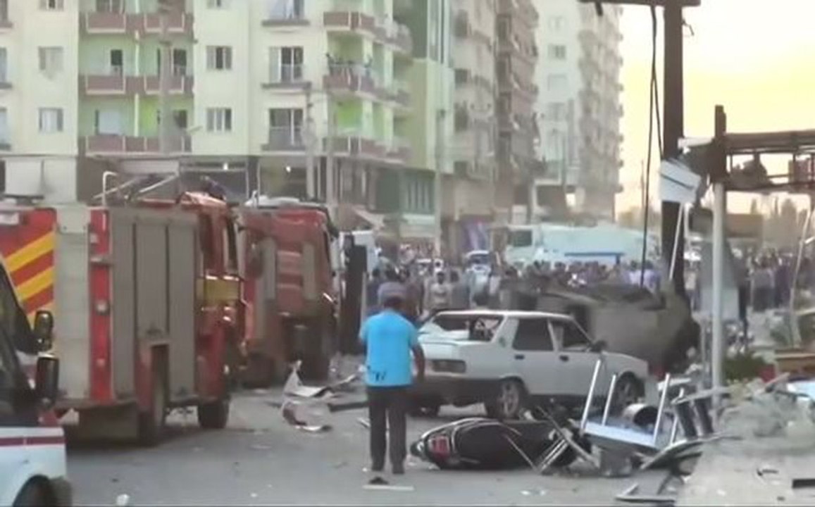 Bomb attacks, cross-border fire kill 13 in southeast Turkey
