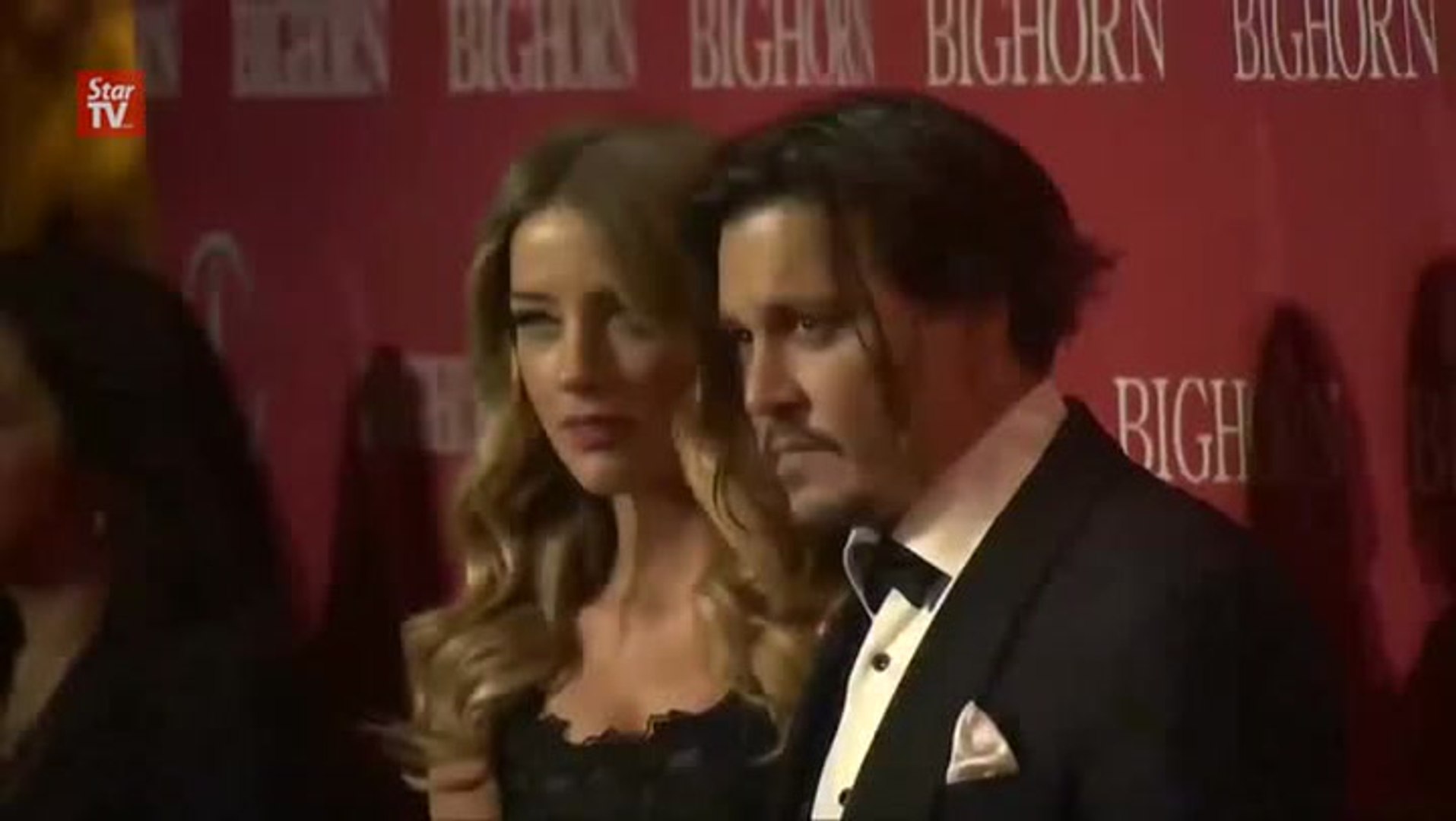 ⁣Johnny Depp and Amber Heard settle divorce case