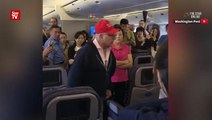 United Airlines flight removes man with Donald Trump cap