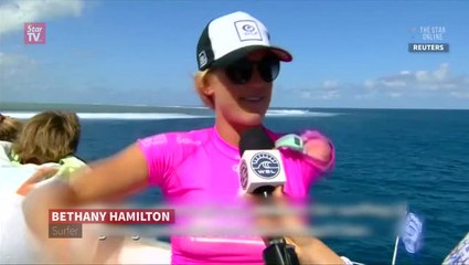 One-armed surfer beats world number one