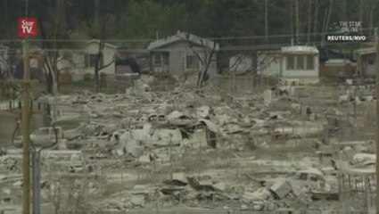 Canada wildfire evacuees begin emotional return home
