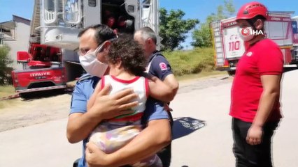 Yangın çıkan binada mahsur kalan vatandaşları itfaiye kurtardı