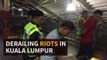 Derailing riots in Kuala Lumpur
