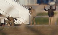 Passengers freed, hijackers demand asylum in Libyan plane hijack drama