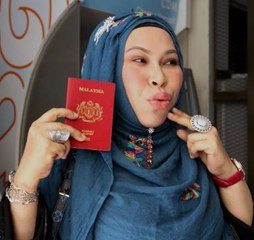 Dr Vida jumps for joy after passport returned