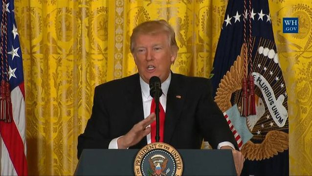 Feisty Trump shouts down media