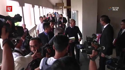 Former ministry sec-gen, son charged with graft