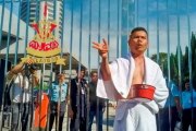 Towel-clad Jamal Yunos stages water cut protest