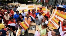Penang floods: Relief aid convoy rolls into Penang