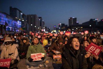 South Koreans protest against president