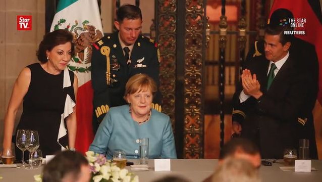 Merkel believes UK will stick with its Brexit plan