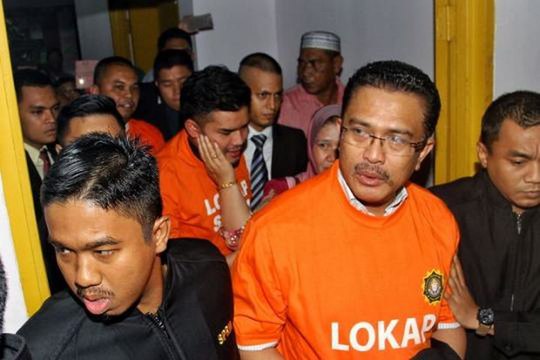 Ex-Johor exco Abd Latif Bandi and son among three charged with money laundering
