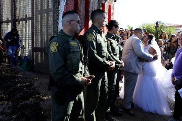 Couple tie the knot across US-Mexico barrier