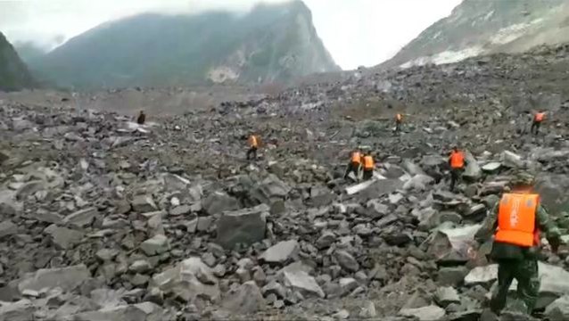 Over 100 people buried in landslide in southwest China