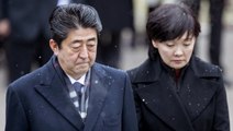 Japan's Abe under fire over suspected scandal