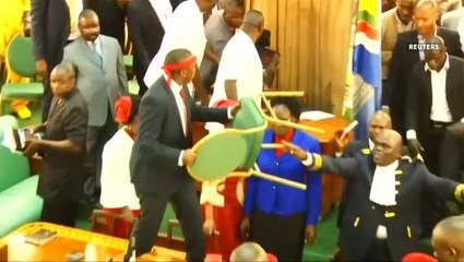 Chairs, poles, fists fly in Uganda parliament