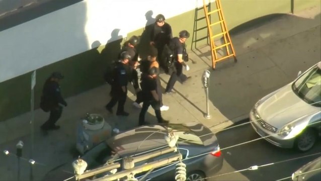 Murder suspect in L.A. hostage standoff named