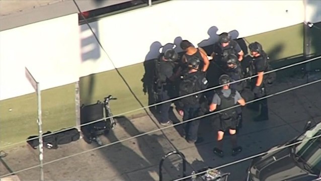 Gunman arrested after Los Angeles store hostage standoff