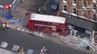 Two trapped after London double-decker bus crashes into building