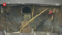 Sinkhole swallows up Japanese road