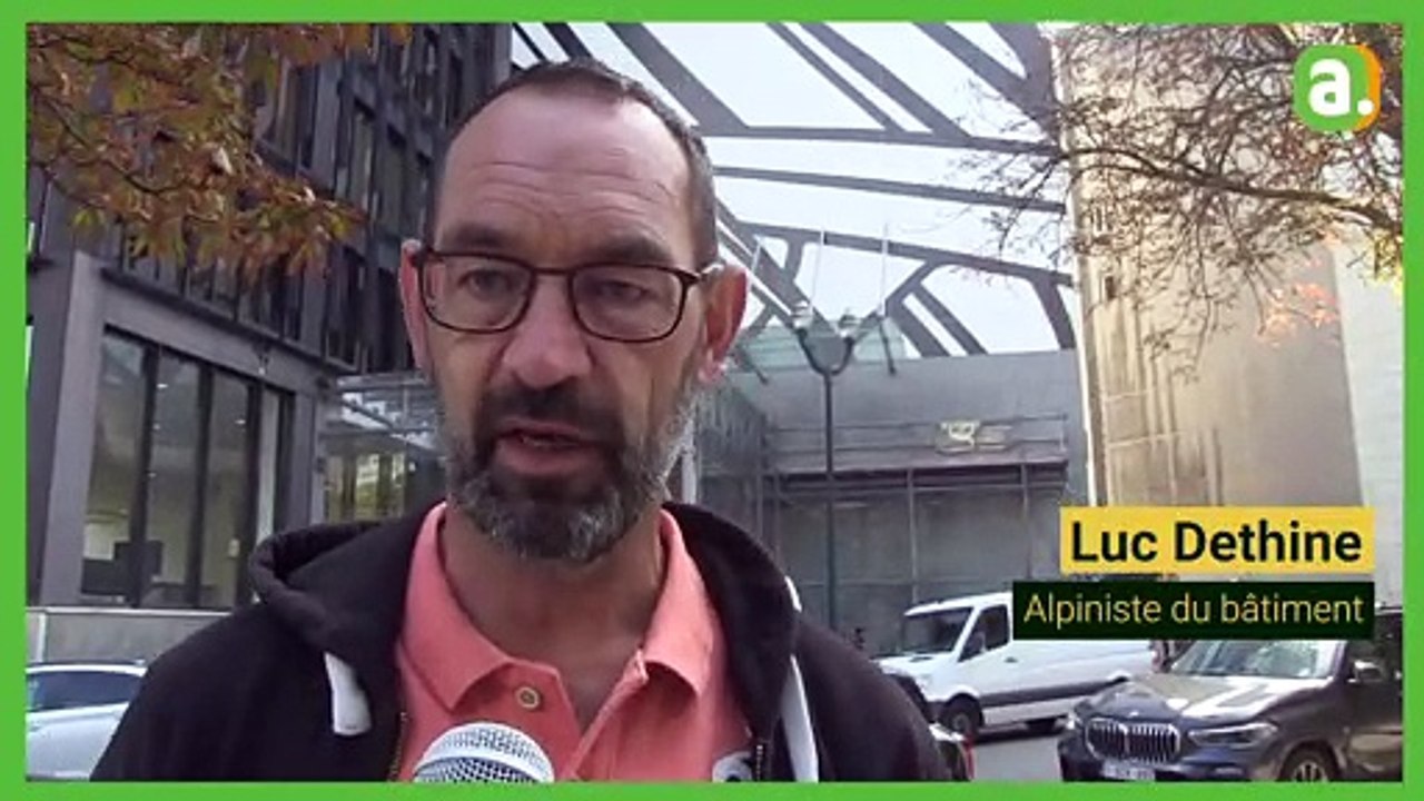 Les pieds dans le vide, ces Namurois déroulent une fresque de 4000 m2
