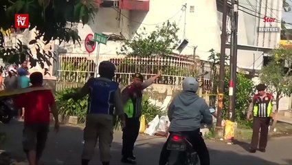 More than a dozen killed in Indonesia church bombings