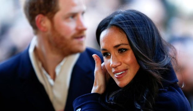 Prince Harry and Meghan Markle dazzle crowds on first official walkabout