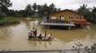 Rainmakers bring food to flood victims