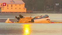 Two dead after plane crashes into river during Australia Day show
