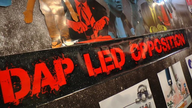 Pakatan caricature wall on display at sidelines of Umno AGM