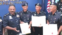 Three policemen receive award after saving woman who jumped off Penang bridge