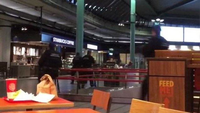 Police shoot knife-wielding man at Amsterdam airport shopping area