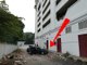 Car overshoots car park wall, plunges two floors