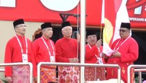 Umno AGM begins with flag-raising ceremony