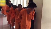 Teens among eight charged with murder in school