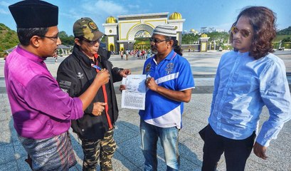 Four protest against Tommy Thomas’ appointment as AG