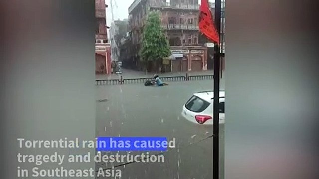 Submerged cars, flooded roads after heavy rains in northern India