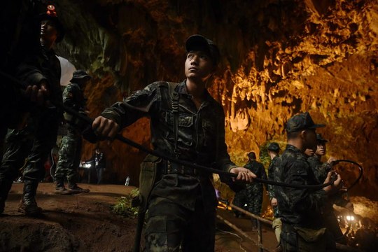 Thailand continues search for teenagers trapped in flooded cave
