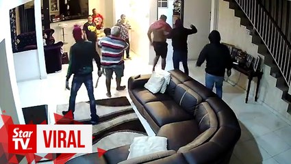 Cops seeking armed home invaders seen in viral video