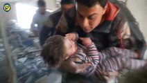 Syrian boy rescued from rubble after an air strike