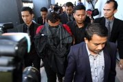 Immigration bigwigs plead not guilty to graft