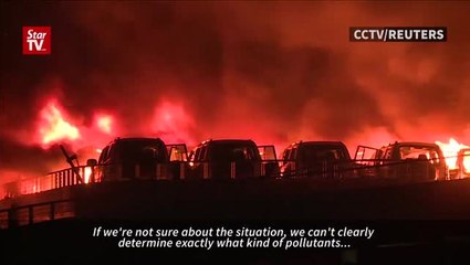 Tianjin blast site still in flames