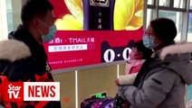 Wuhan shuts down public transportation, as WHO mulls 'global emergency'