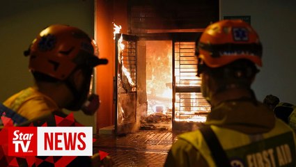 Download Video: Hong Kong protesters torch planned coronavirus quarantine building