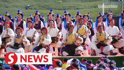 Grand traditional folk dance show in Tibet, China